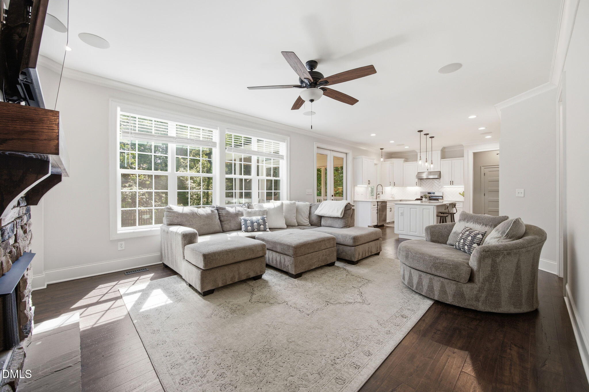 211 Long Street Fuquay-Varina, NC 27526 - Photo 8 of 38 a living room with furniture and a large window