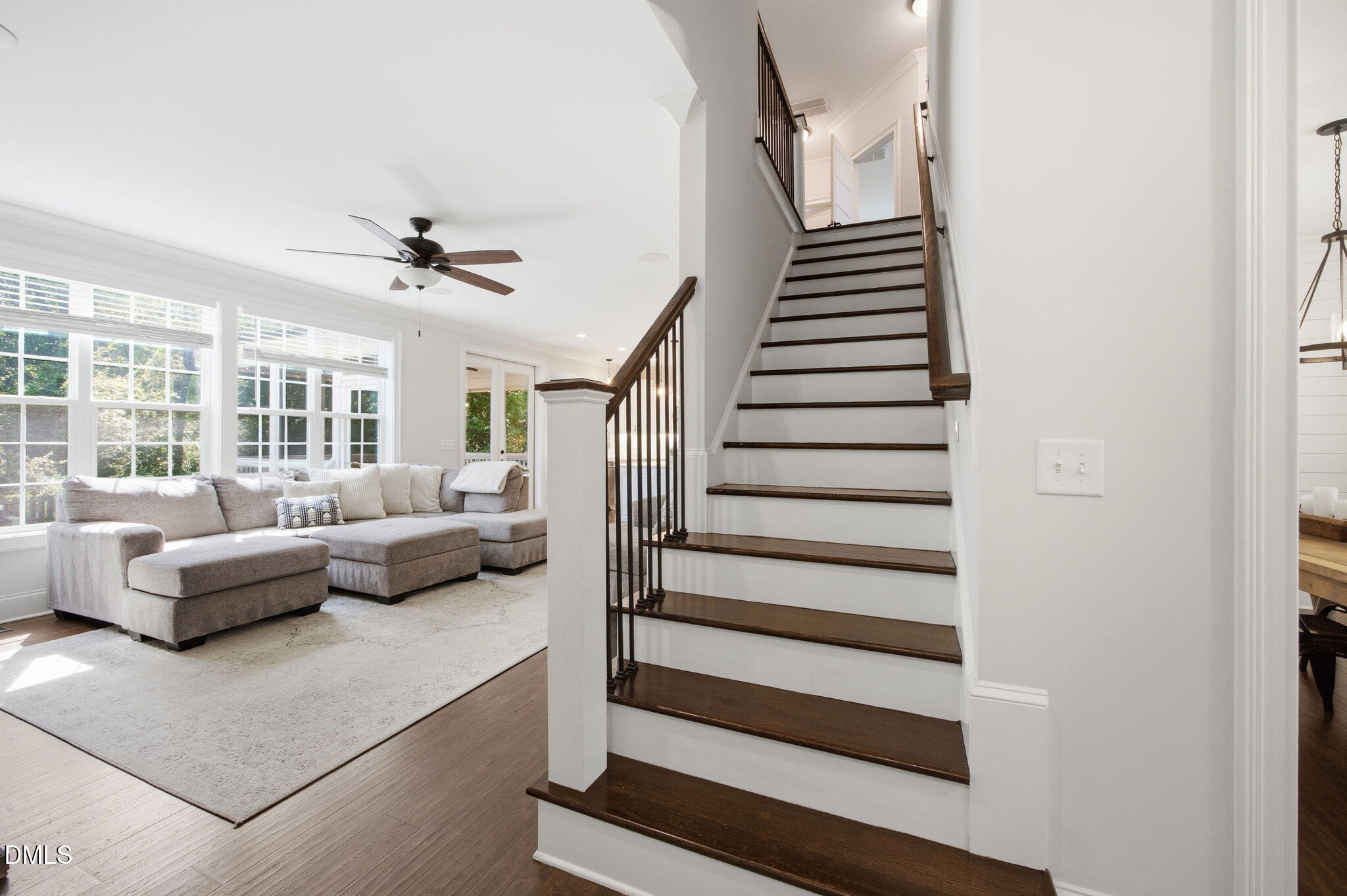 211 Long Street Fuquay-Varina, NC 27526 - Photo 9 of 38 a living room with furniture and stairs