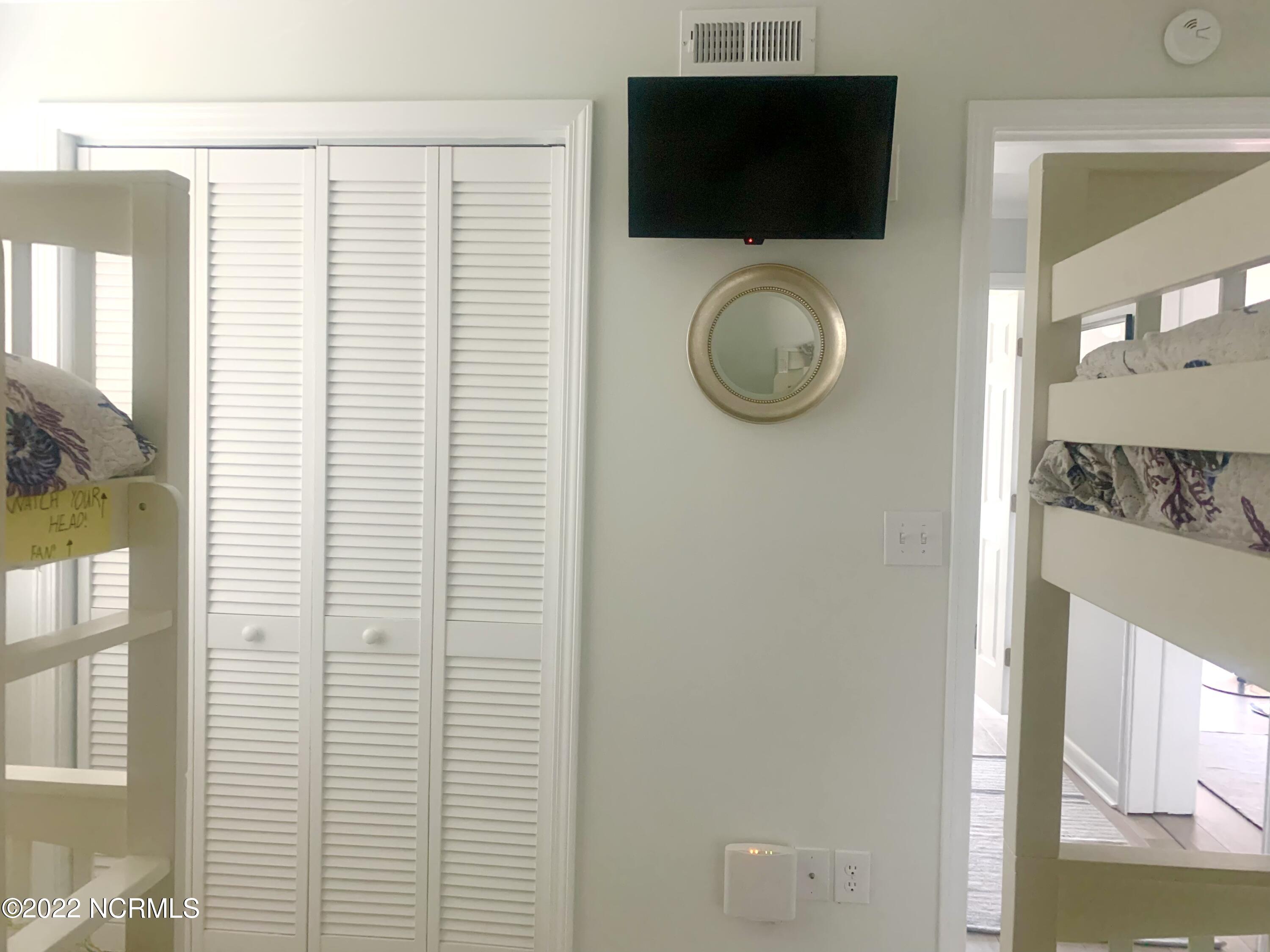 2008 East Fort Macon Road, Unit G 8 Atlantic Beach, NC 28512 - Photo 29 of 55 Closet & YTv for Bedroom #2