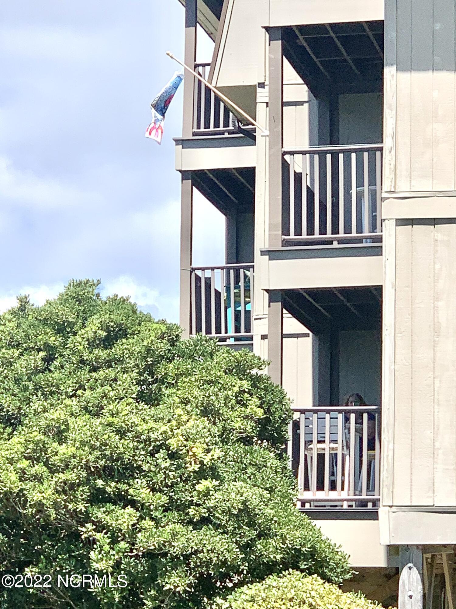 2008 East Fort Macon Road, Unit G 8 Atlantic Beach, NC 28512 - Photo 37 of 55 Outside Balcony w/Flag