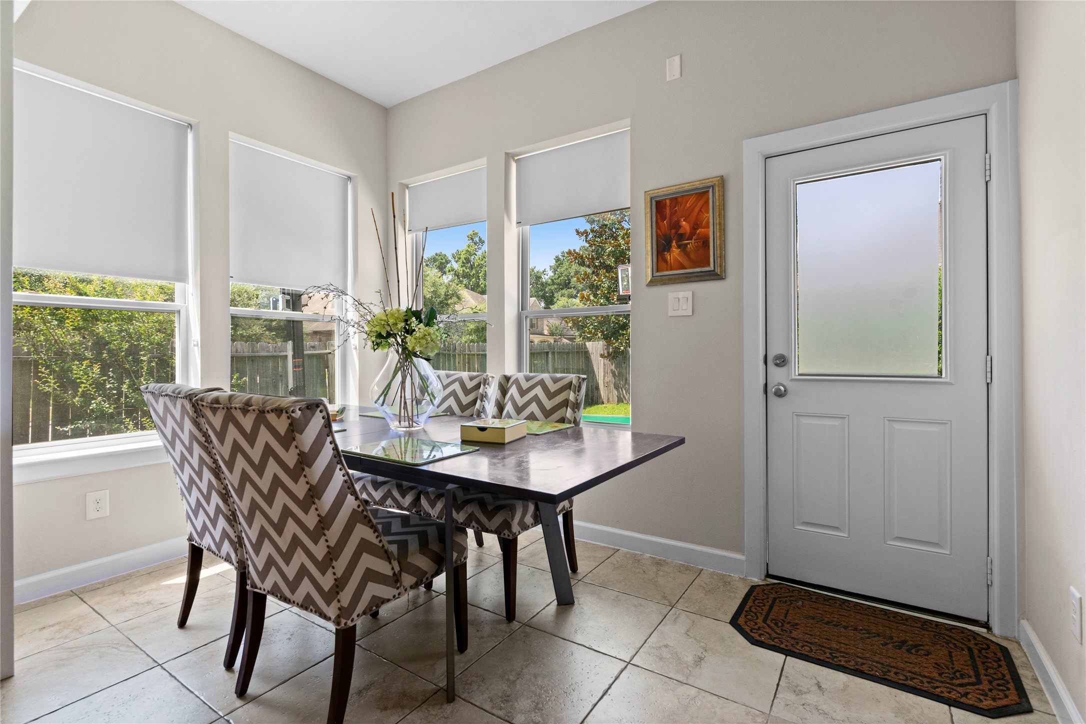 31503 Reston Cliff Court Spring, TX 77386 - Photo 13 of 28 a view of a dining room with furniture and a window