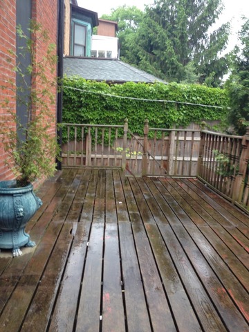 522 West Deming Place Chicago, IL 60614 - Photo 9 of 9 a view of balcony with wooden floor and fence