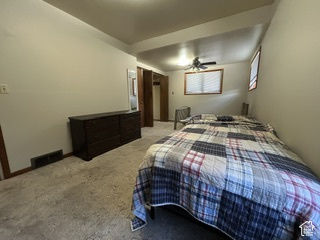 481 East Center Street Logan, UT 84321 - Photo 10 of 23 Recessed ceiling light, ceiling fan, window with blinds, wood-finish trim, and wall-to-wall carpeting