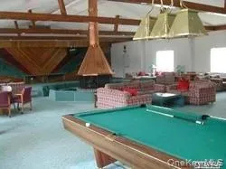 a view of a backyard with a patio