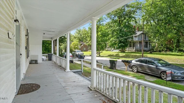 a view of bathroom with a sink and a mirror