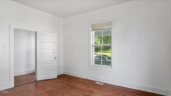 a room with a fireplace and a table