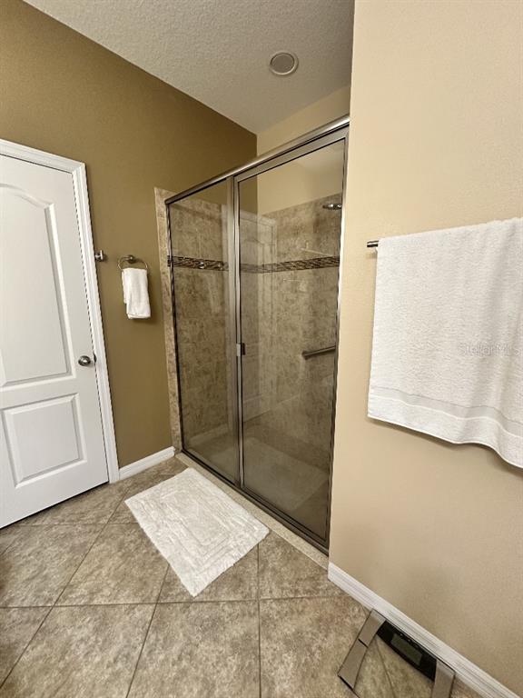 11248 Mollymawk Court New Port Richey, FL 34654 - Photo 14 of 21 a bathroom with a shower and toilet