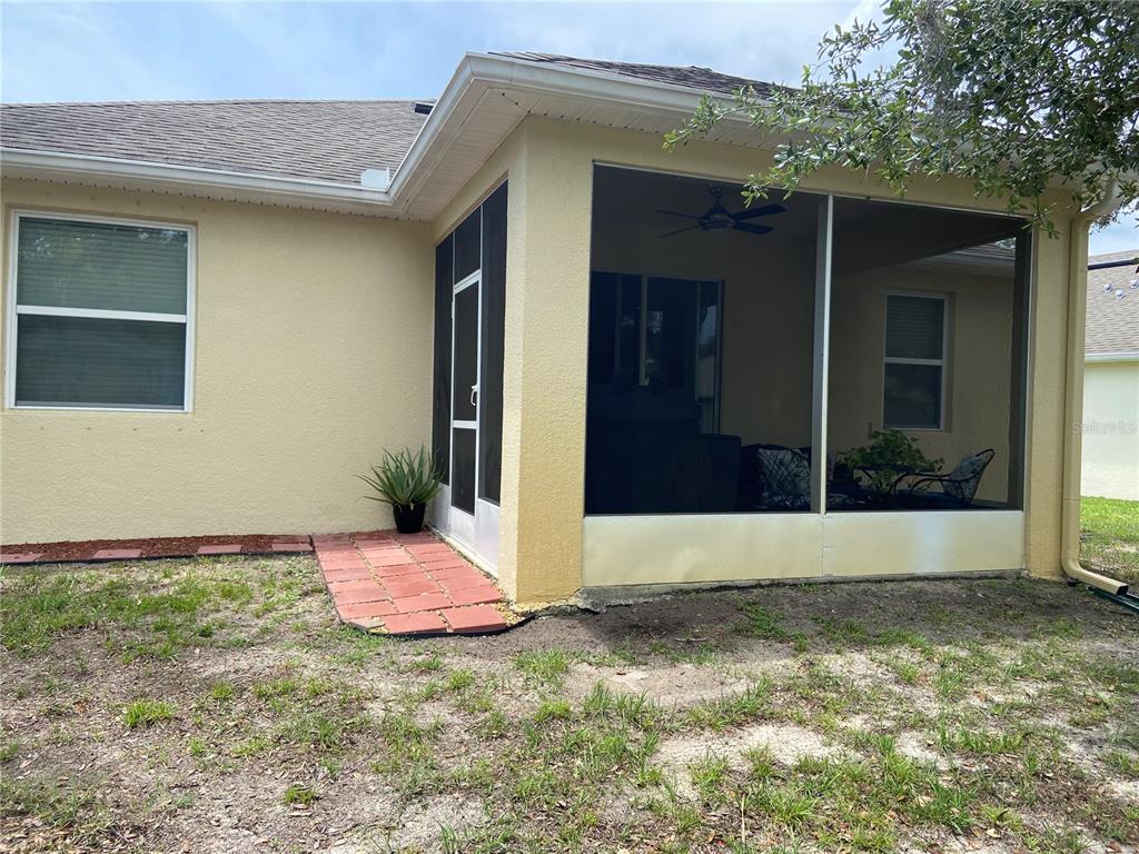11248 Mollymawk Court New Port Richey, FL 34654 - Photo 18 of 21 a front view of a house with a yard