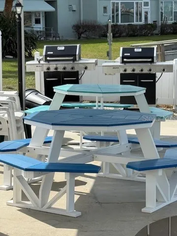 a stove top oven sitting inside of a kitchen