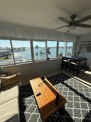 a room with gym equipment and a large window