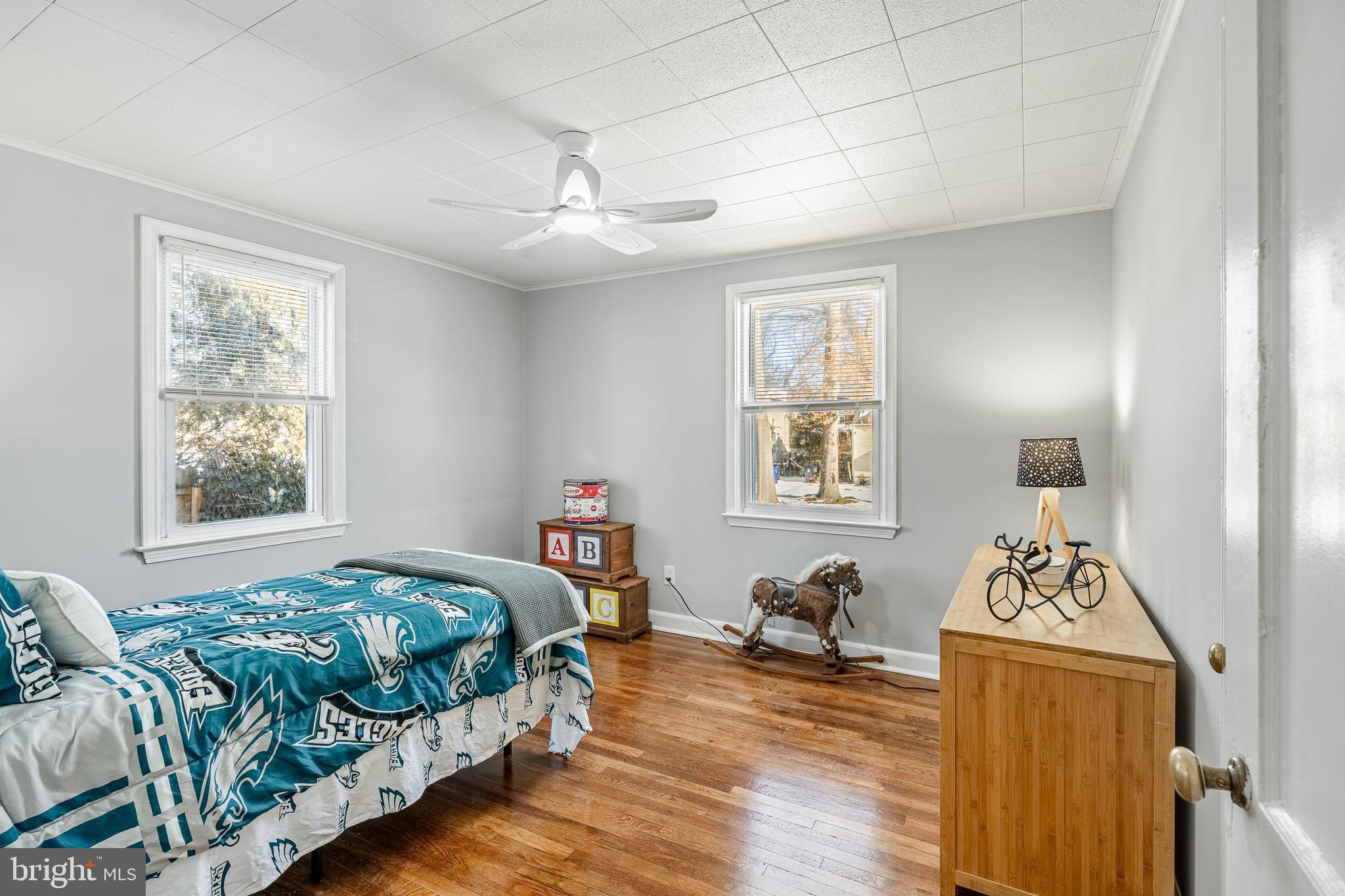 8 Garrett Road Wilmington, DE 19809 - Photo 21 of 37 a bedroom with furniture and a window