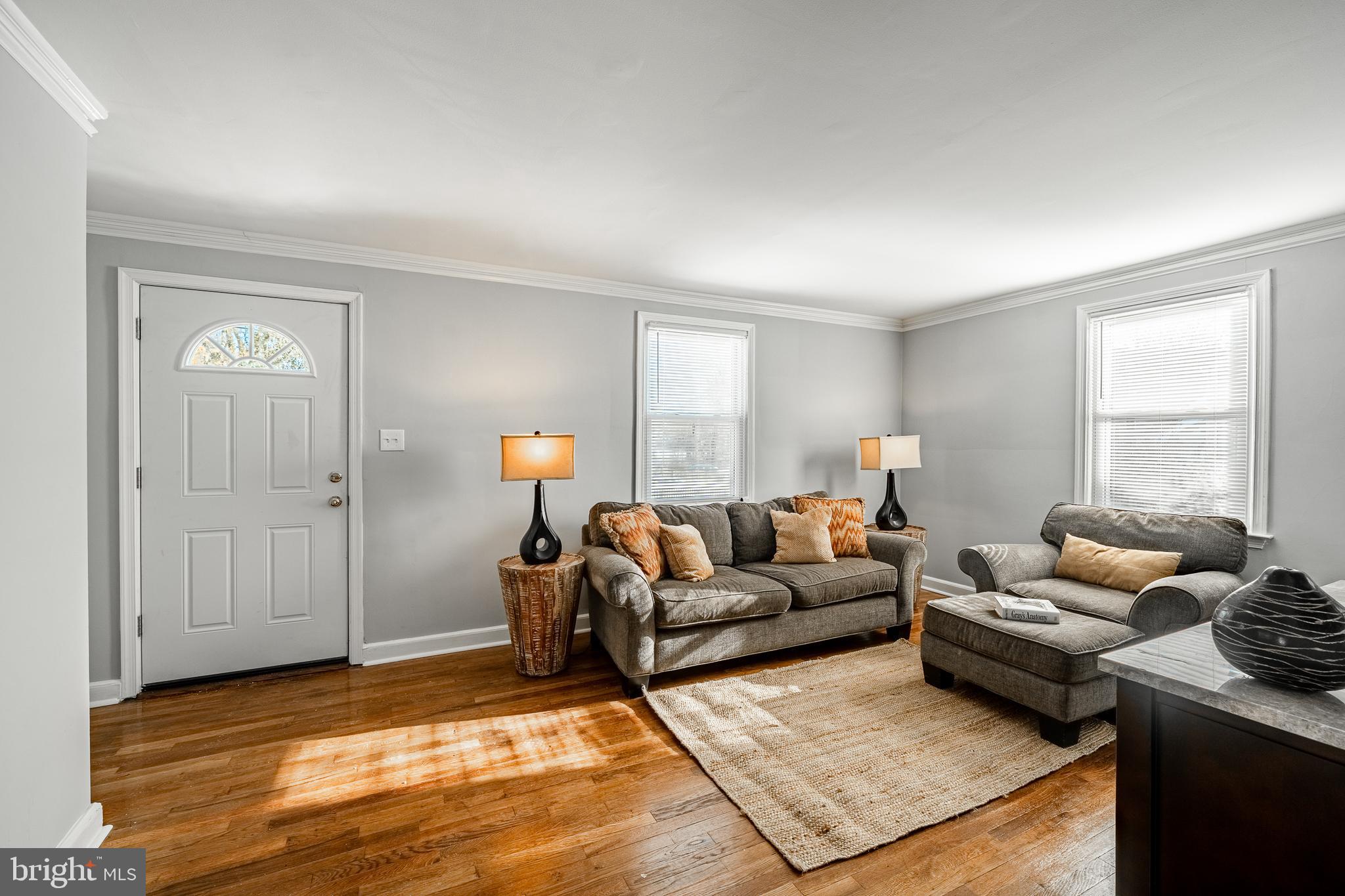 8 Garrett Road Wilmington, DE 19809 - Photo 3 of 37 a living room with furniture rug and window
