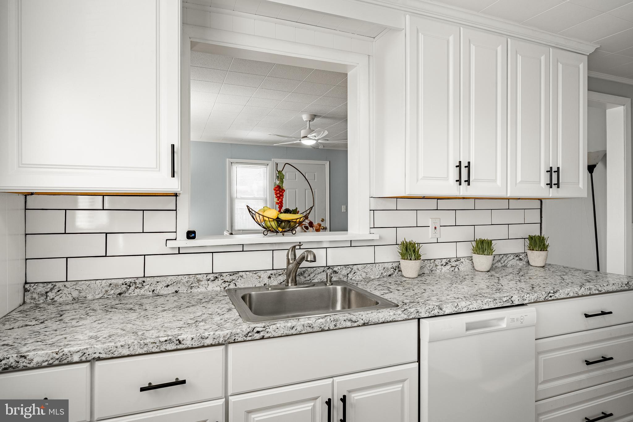 8 Garrett Road Wilmington, DE 19809 - Photo 9 of 37 a close view of sink and tap