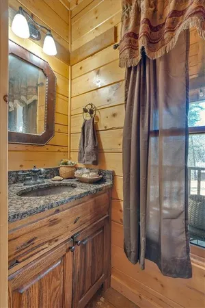 a bedroom with furniture and a chandelier