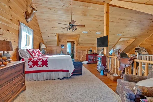 a kitchen with stainless steel appliances granite countertop a refrigerator a stove and a sink