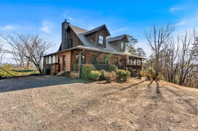 a view of a building with a yard