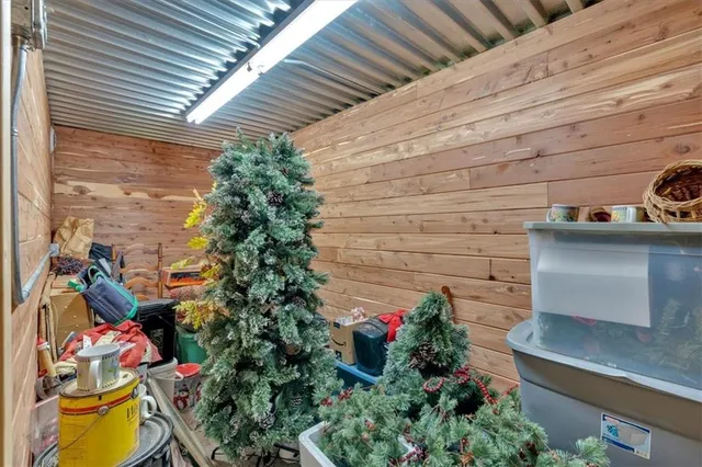 a view of a balcony dining area with furniture