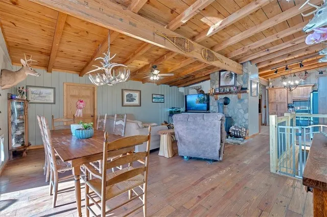 an aerial view of a house with mountain view