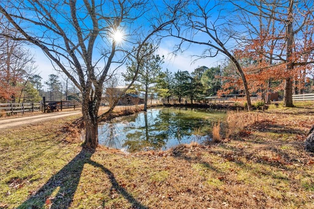 2623 Big Texas Valley Road Northwest Rome, GA 30165 - Photo 61 of 90 a backyard of a house with lots of green space