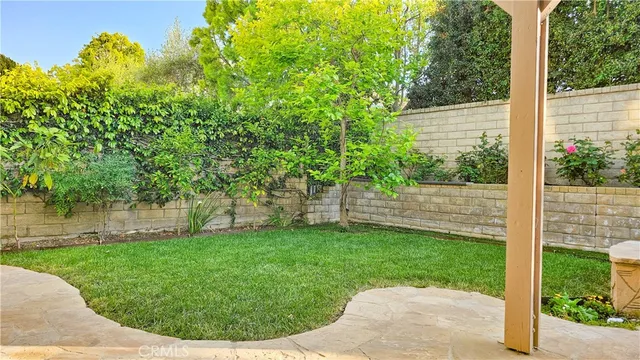 a view of a backyard with a garden