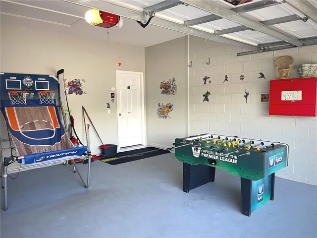 a view of an empty room with windows