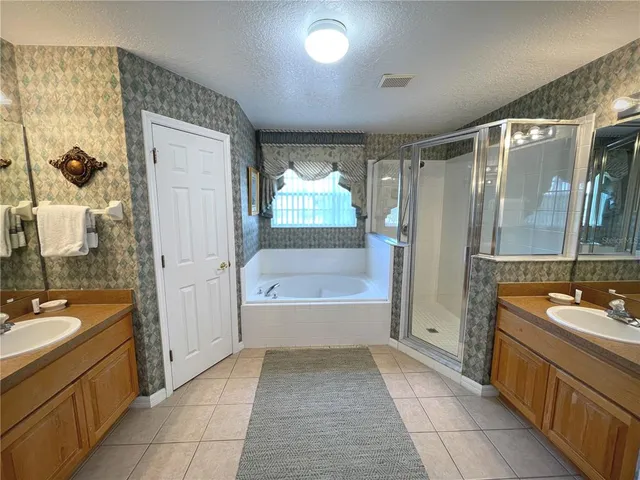 a view of a hallway with windows