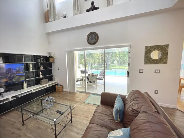 a view of a dining area with furniture window and outside view