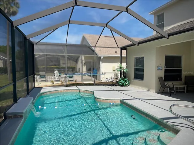 a view of swimming pool with outdoor space