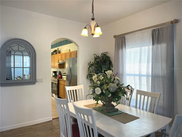 a kitchen with stainless steel appliances granite countertop a stove and a sink