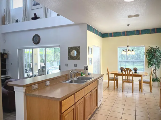 a room with lots of windows and glass door