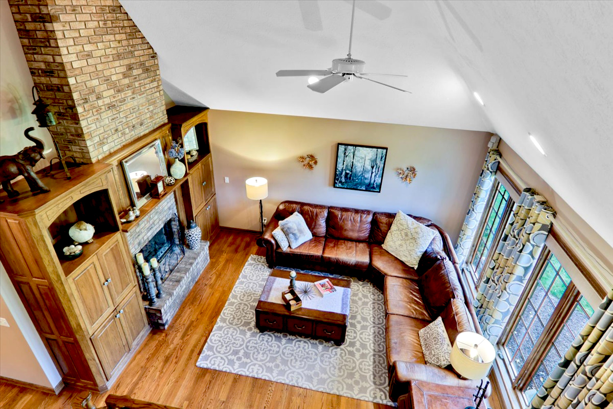 20379 Cedar Avenue Downs, IL 61736 - Photo 32 of 97 a living room with furniture and a flat screen tv