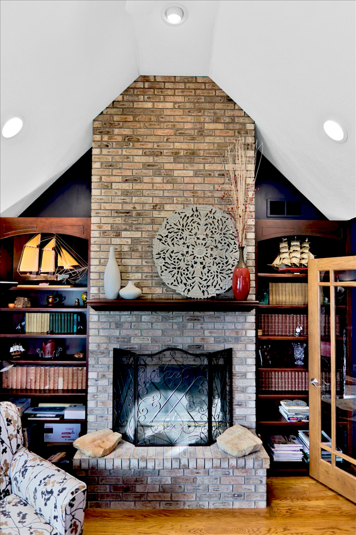 20379 Cedar Avenue Downs, IL 61736 - Photo 36 of 97 a living room with furniture and a fireplace