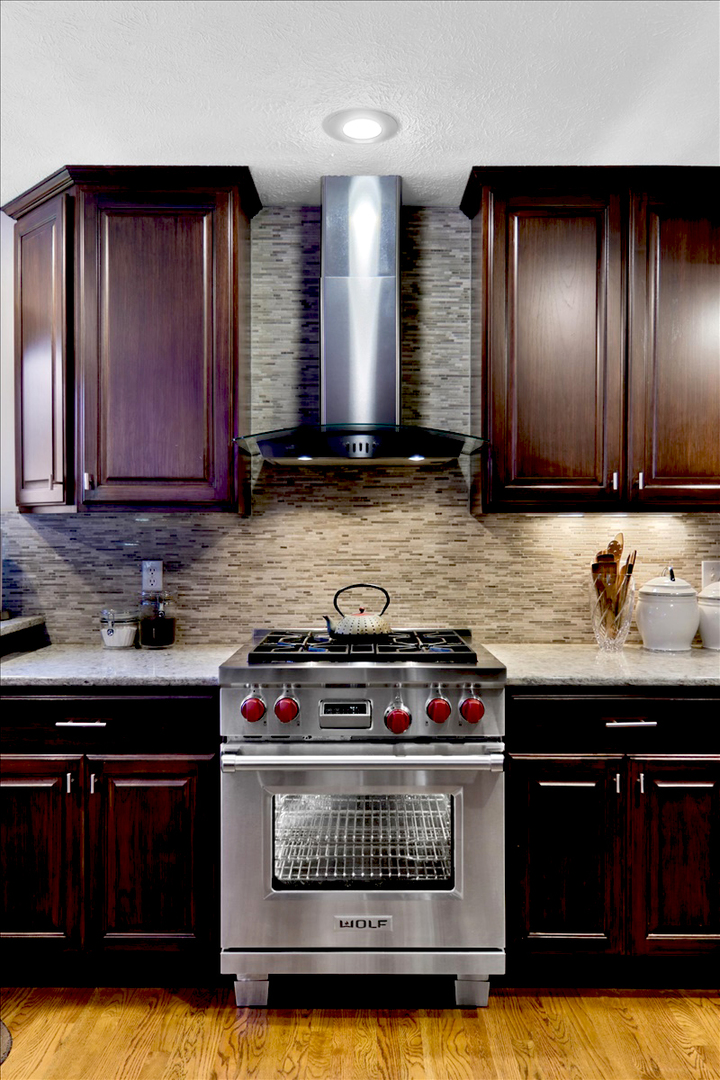 20379 Cedar Avenue Downs, IL 61736 - Photo 49 of 97 a kitchen with stainless steel appliances granite countertop a stove and a sink