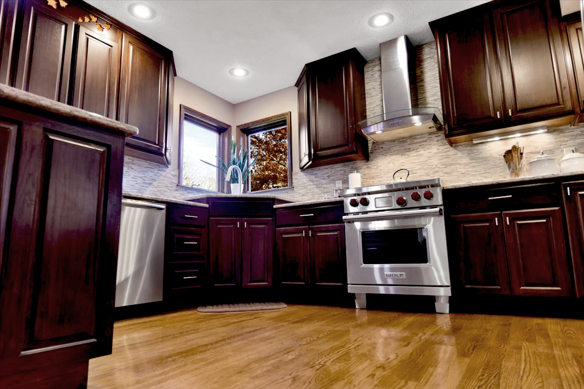 20379 Cedar Avenue Downs, IL 61736 - Photo 51 of 97 a kitchen with stainless steel appliances granite countertop wooden cabinets a stove top oven a sink and dishwasher