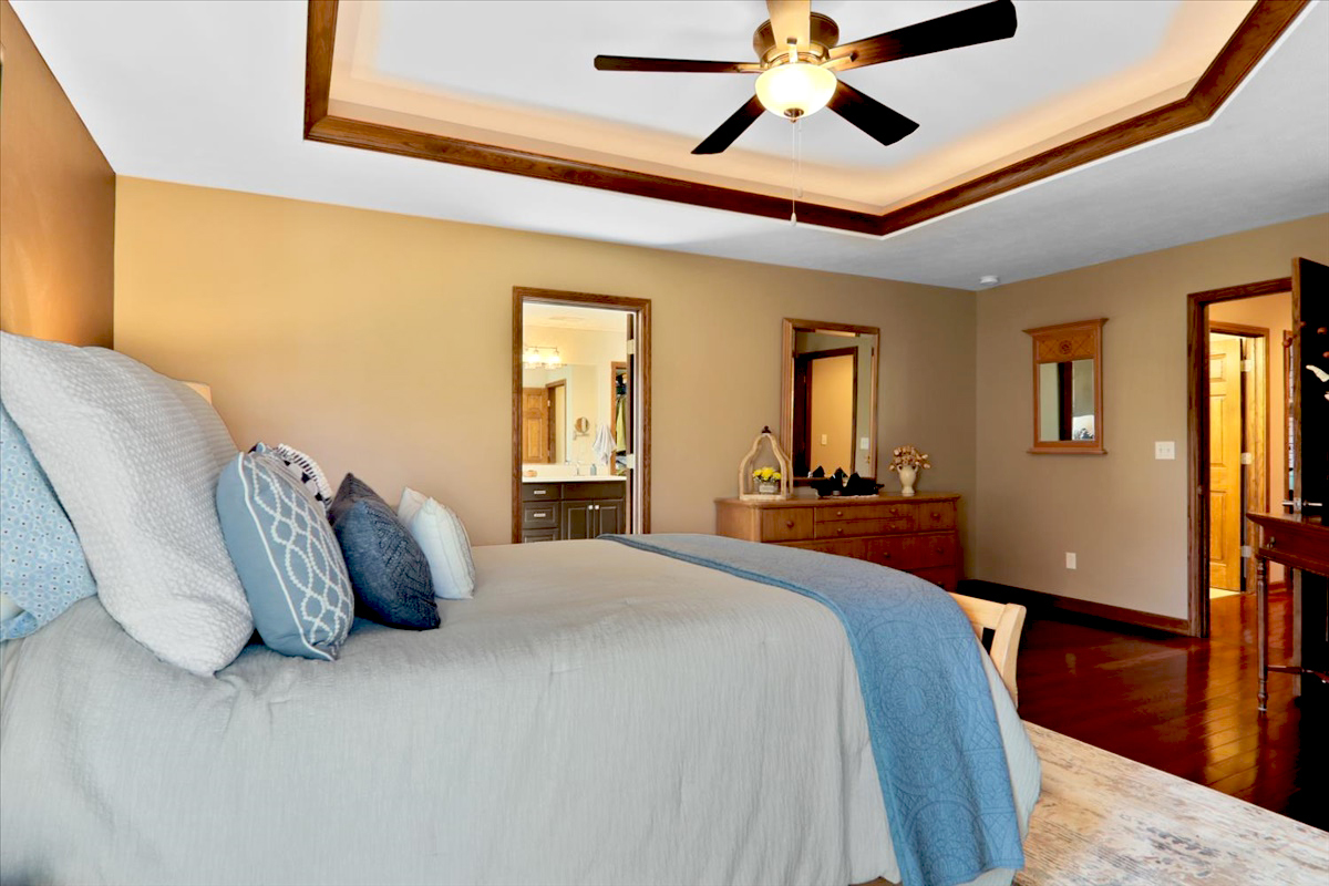 20379 Cedar Avenue Downs, IL 61736 - Photo 57 of 97 a spacious bedroom with a bed and wooden floor