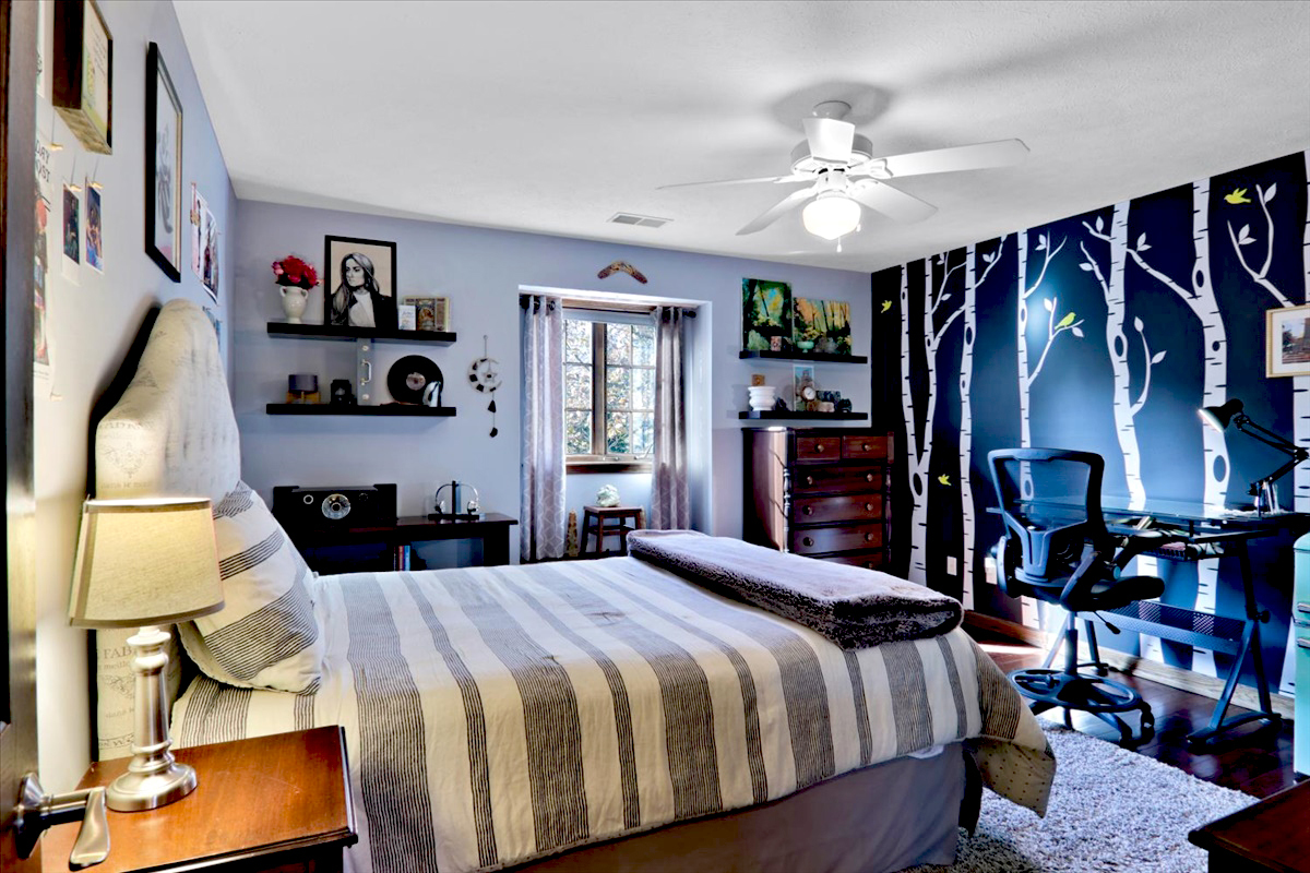 20379 Cedar Avenue Downs, IL 61736 - Photo 70 of 97 a bedroom with a large bed and a chandelier