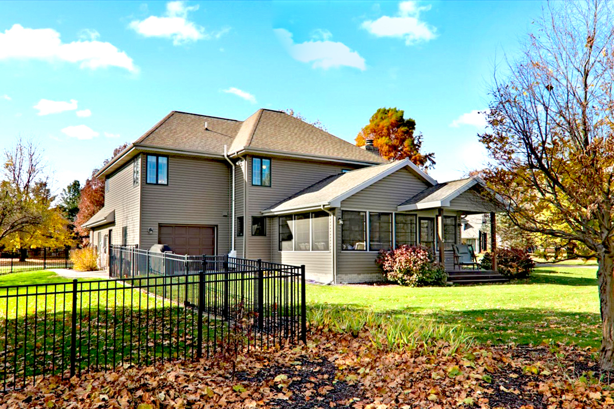 20379 Cedar Avenue Downs, IL 61736 - Photo 96 of 97 a front view of a house with a yard table and chairs