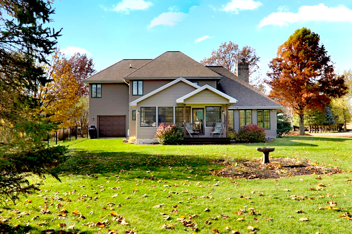 20379 Cedar Avenue Downs, IL 61736 - Photo 10 of 97 a front view of a house with a garden