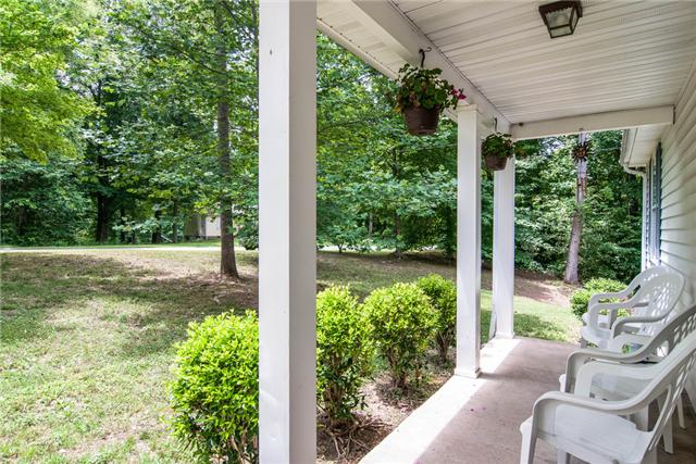 1286 Primm Road Ashland City, TN 37015 - Photo 3 of 18 Great rocking chair front porch