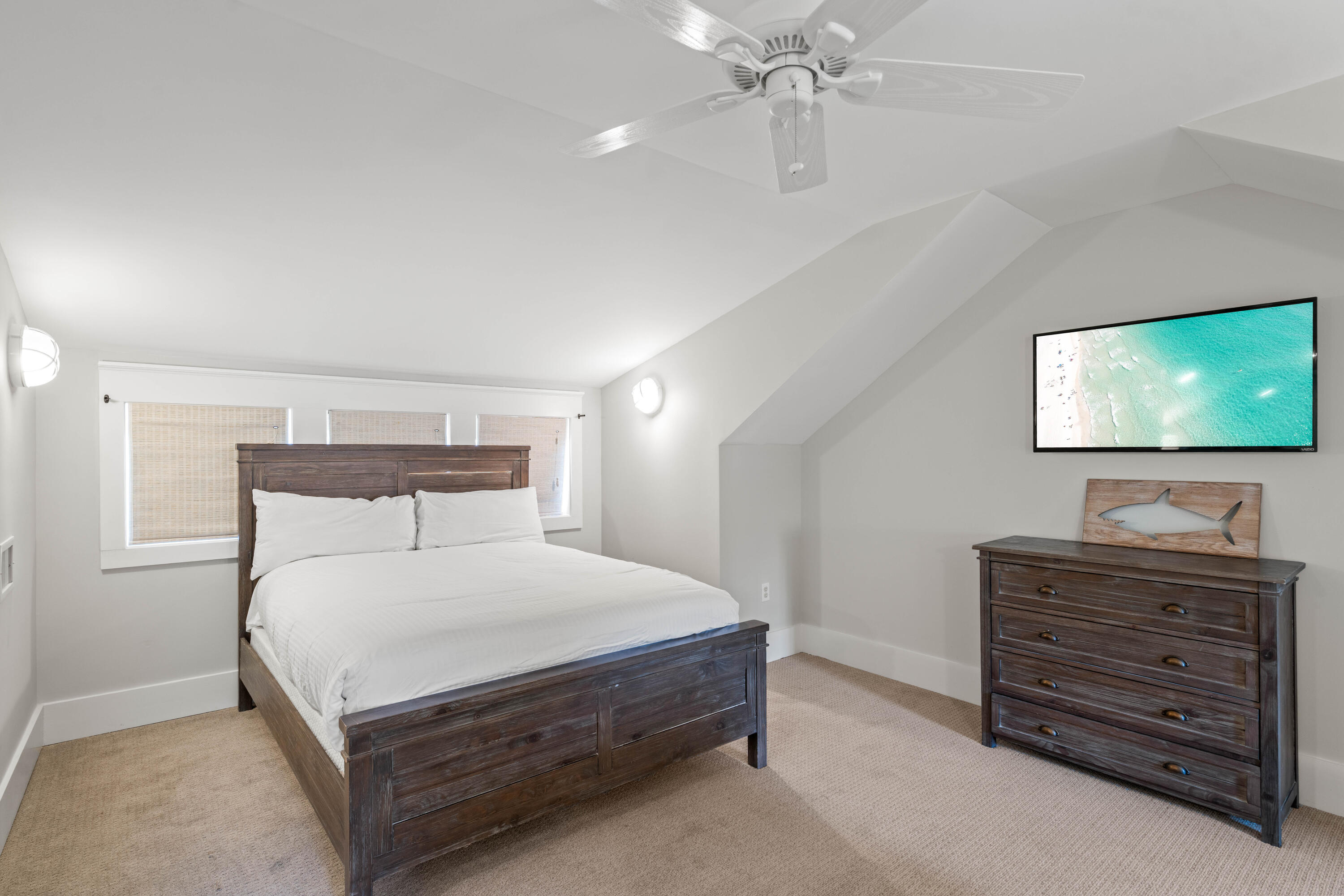 148 Coopersmith Lane Inlet Beach, FL 32461 - Photo 62 of 82 a bedroom with a bed and a flat screen tv
