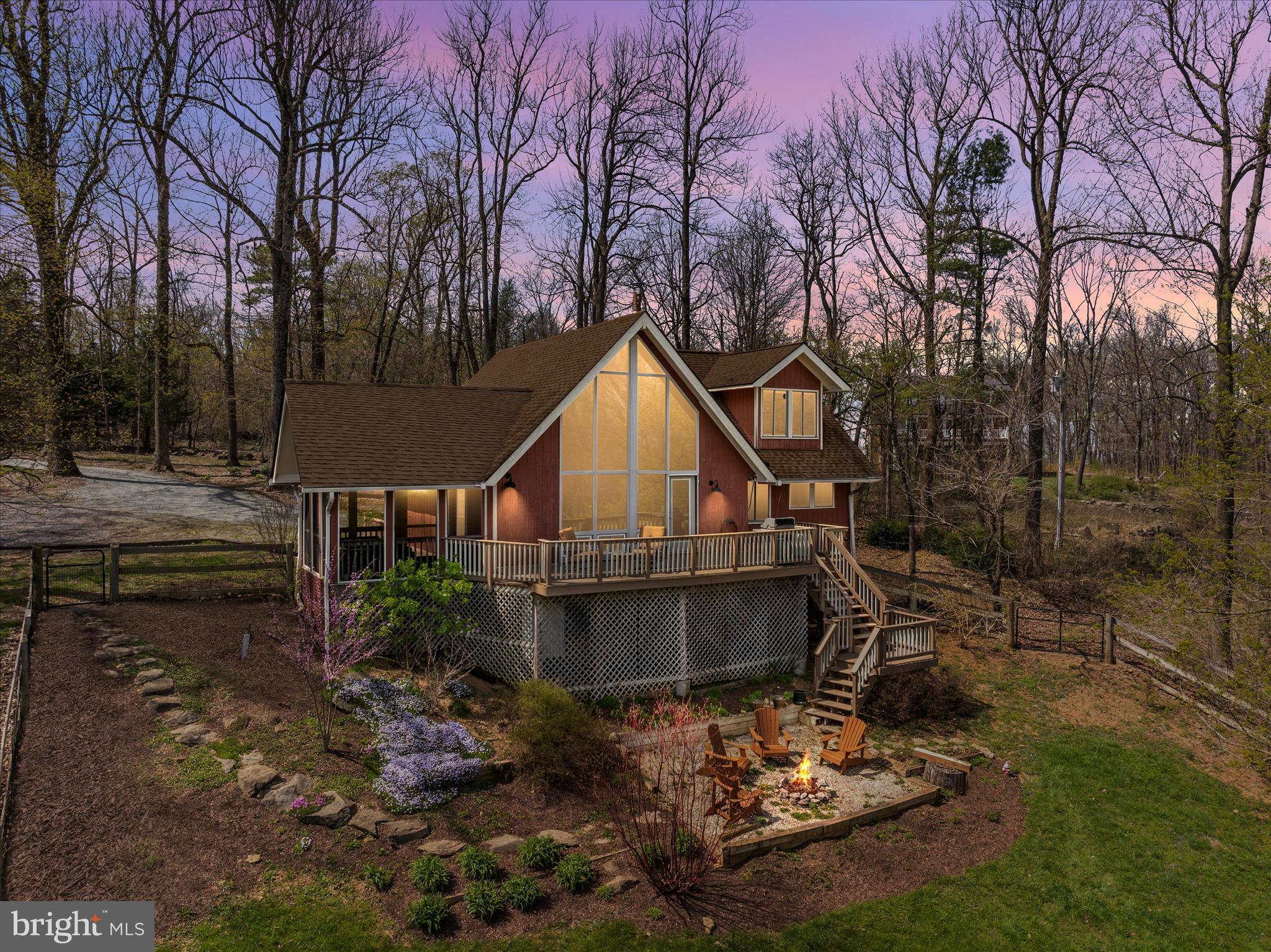 17352 Raven Rocks Road Round Hill, VA 20141 - Photo 17 of 47 a dirt road with trees in front of it