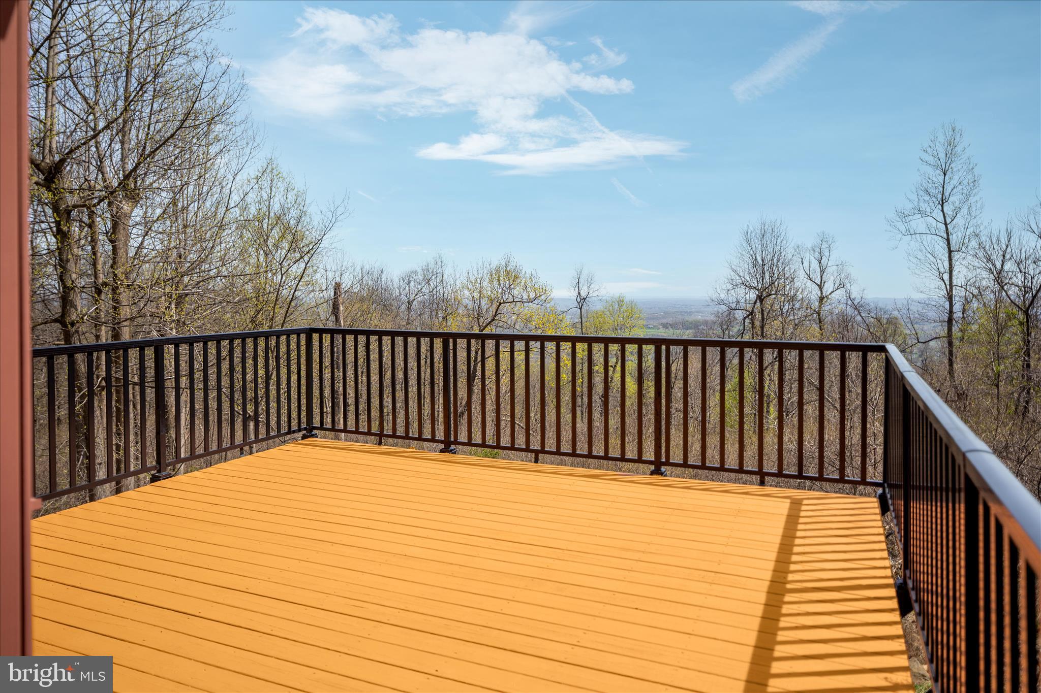 17352 Raven Rocks Road Round Hill, VA 20141 - Photo 19 of 47 a balcony with wooden floor
