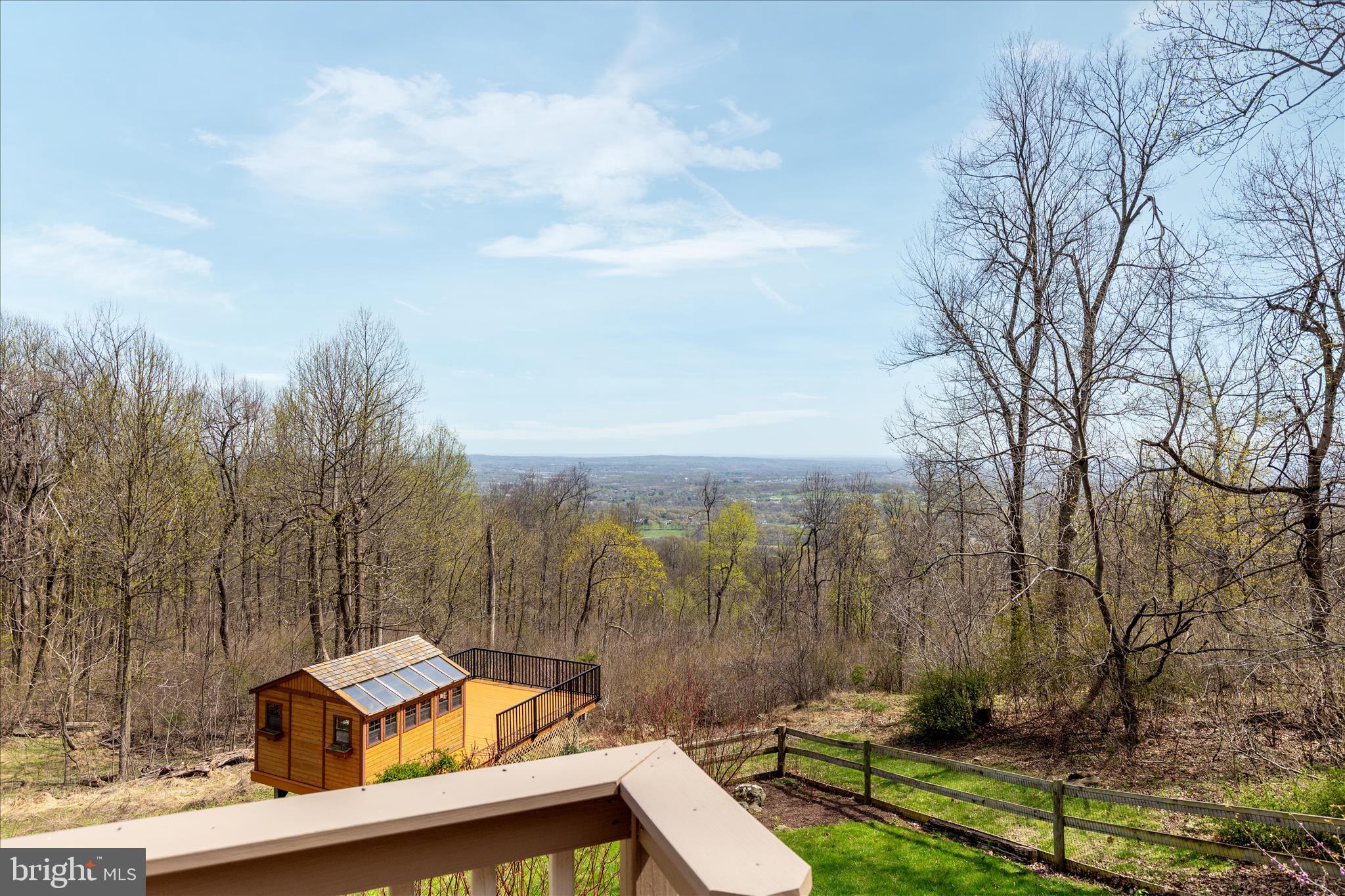 17352 Raven Rocks Road Round Hill, VA 20141 - Photo 2 of 47 a view of a patio with chairs and a yard