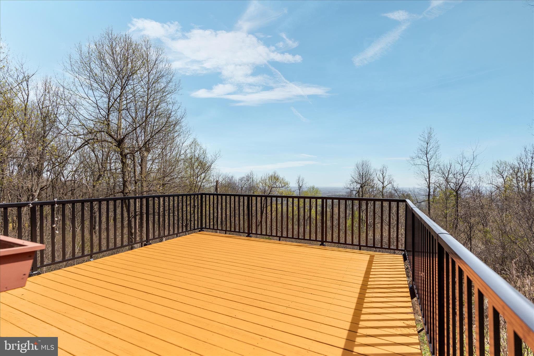 17352 Raven Rocks Road Round Hill, VA 20141 - Photo 21 of 47 a balcony with wooden floor