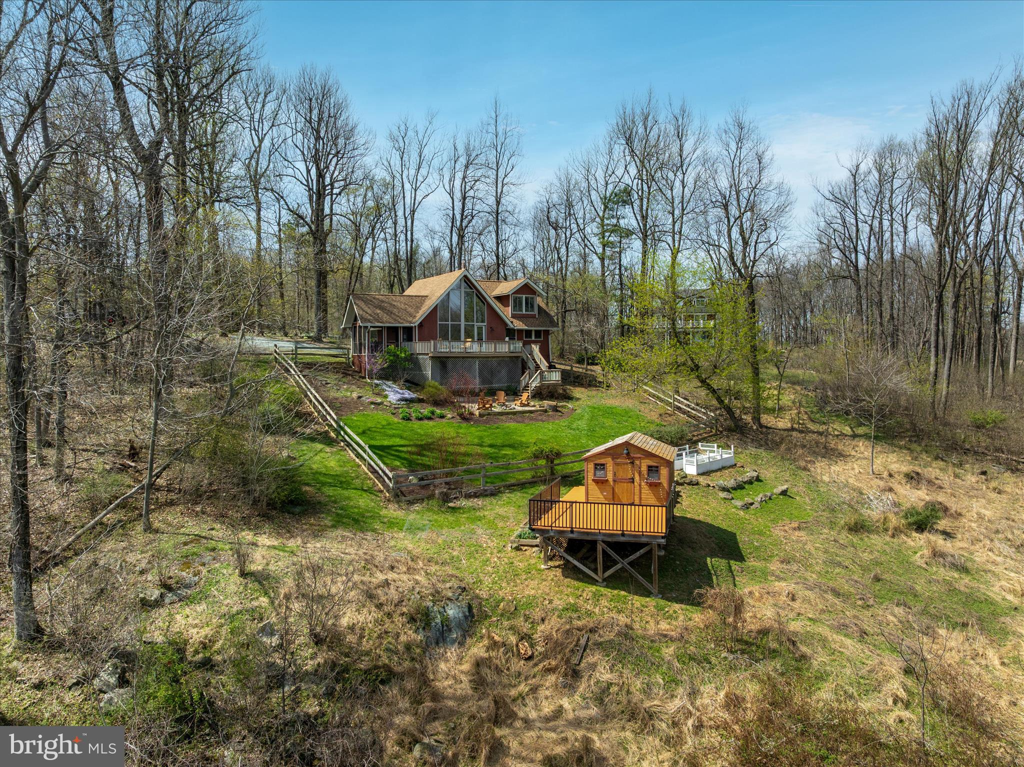 17352 Raven Rocks Road Round Hill, VA 20141 - Photo 43 of 47 a backyard of a house with lots of green space