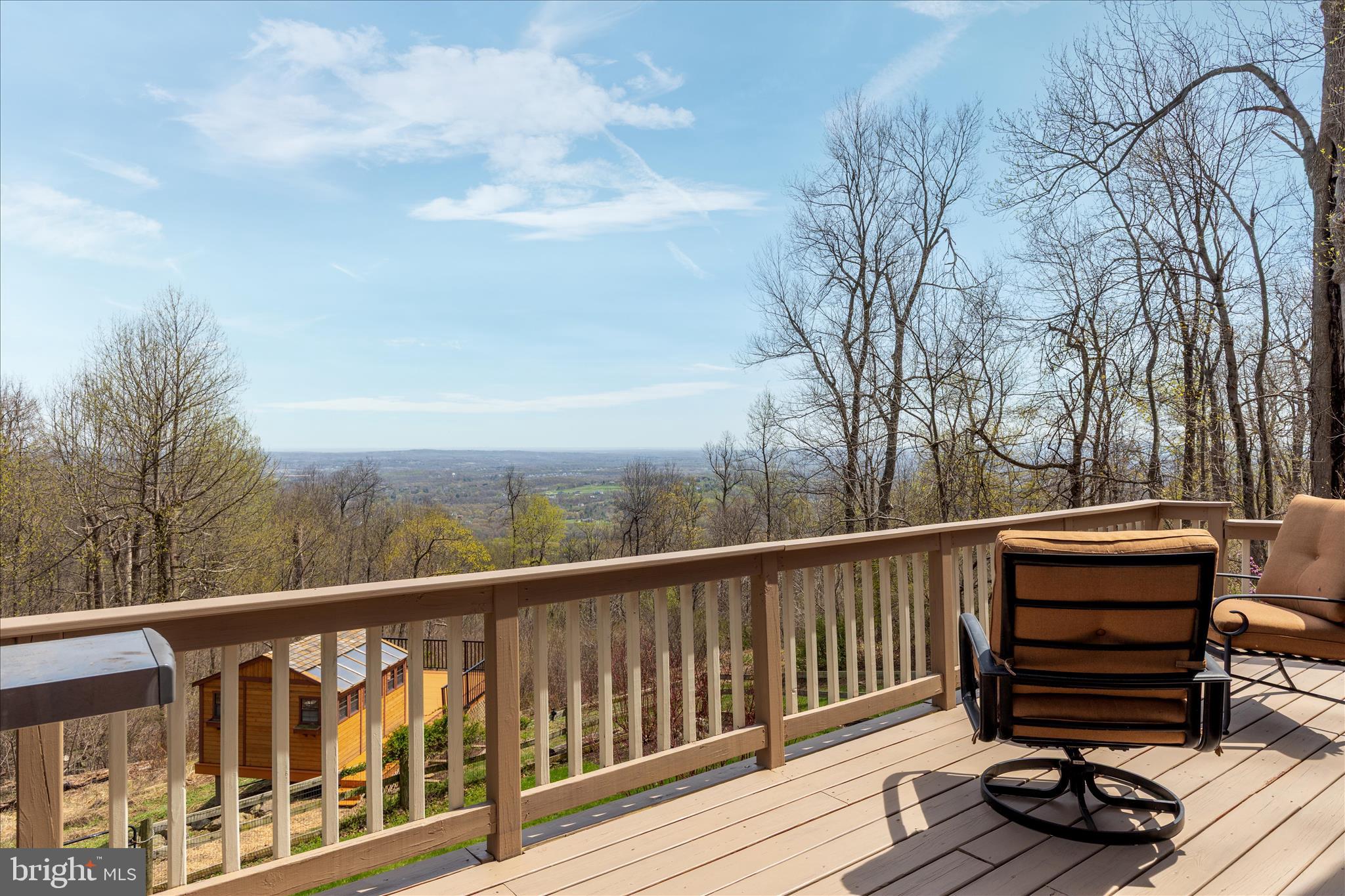 17352 Raven Rocks Road Round Hill, VA 20141 - Photo 6 of 47 a view of balcony with wooden floor and barbeque oven