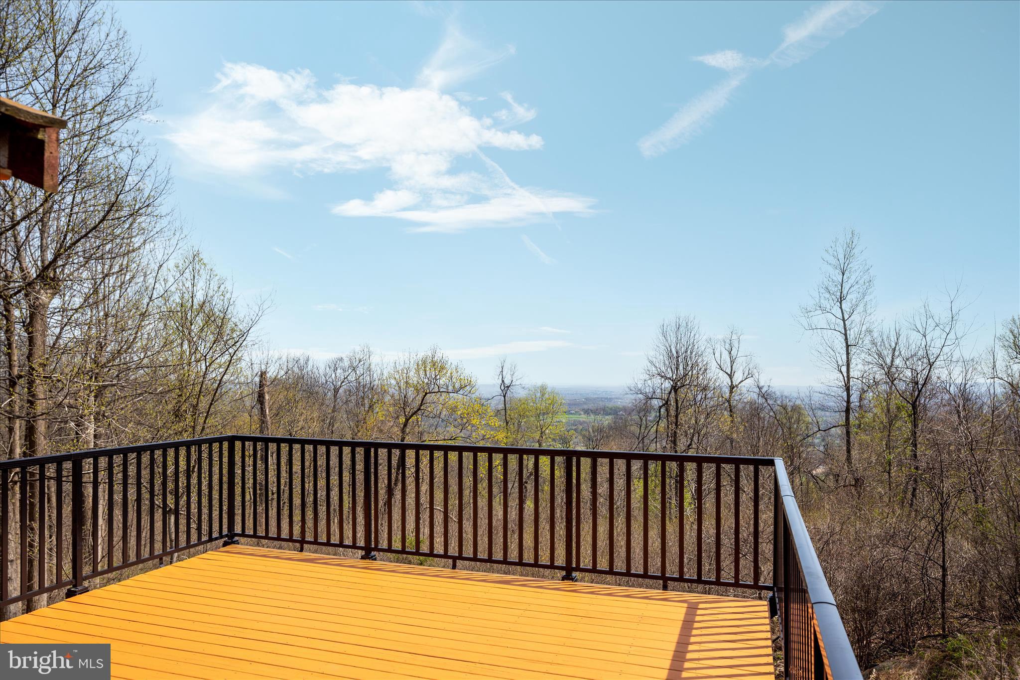 17352 Raven Rocks Road Round Hill, VA 20141 - Photo 9 of 47 a balcony with wooden floor