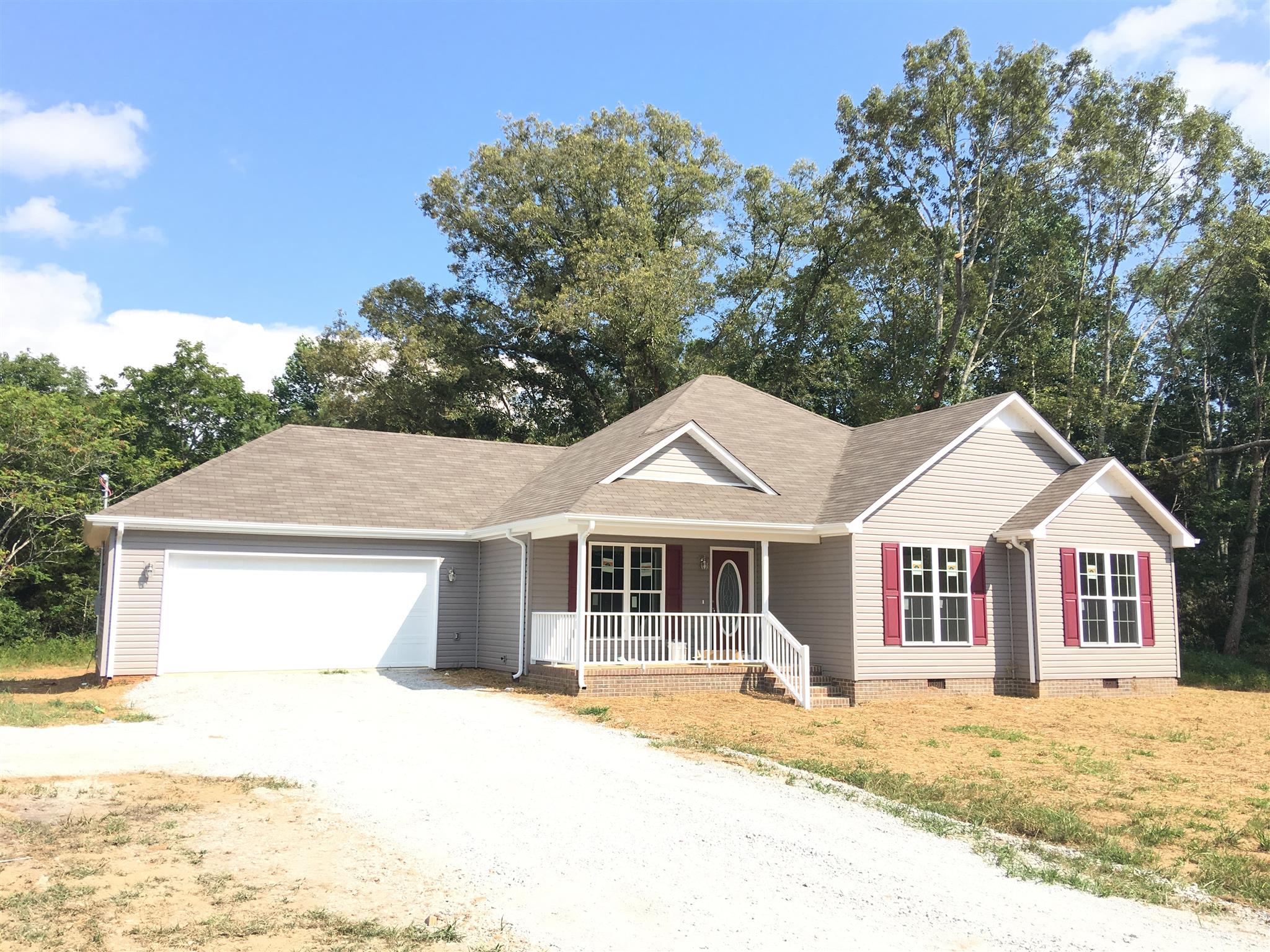 67 Robertson Hollow Road Taft, TN 38488 - Photo 2 of 5 4 Bedrooms and a two-car garage. Porch and deck to enjoy the views.