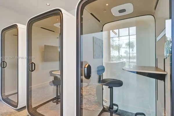 a bathroom with a mirror and a shower