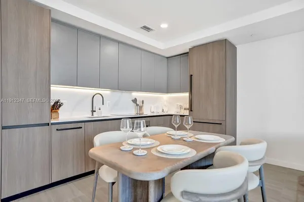 a view of a dining room with furniture